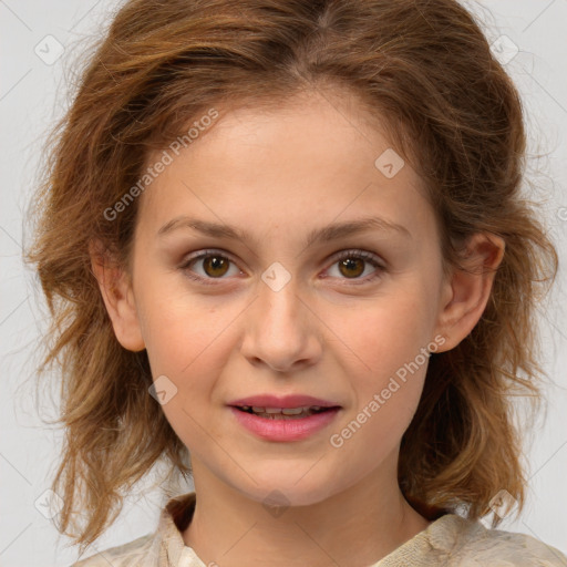 Joyful white child female with medium  brown hair and brown eyes