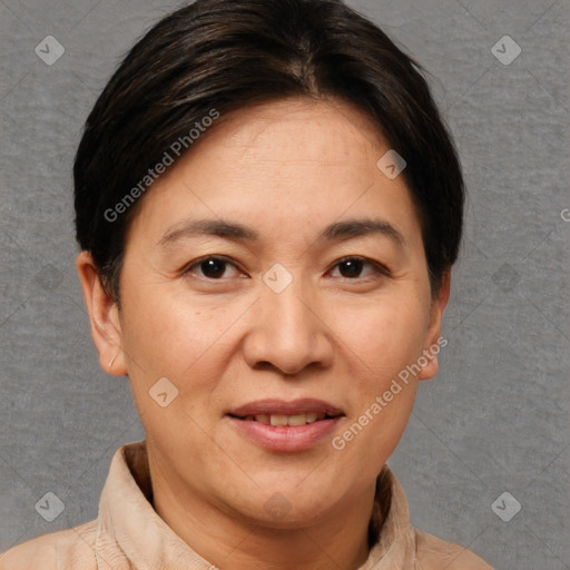 Joyful white adult female with short  brown hair and brown eyes