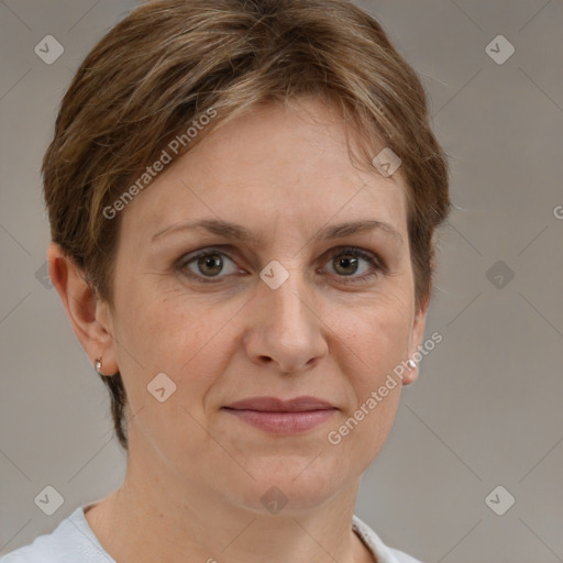 Joyful white adult female with short  brown hair and grey eyes