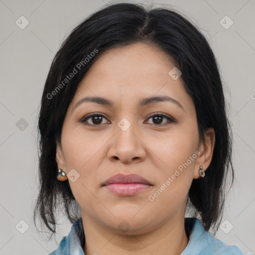 Joyful latino young-adult female with medium  brown hair and brown eyes