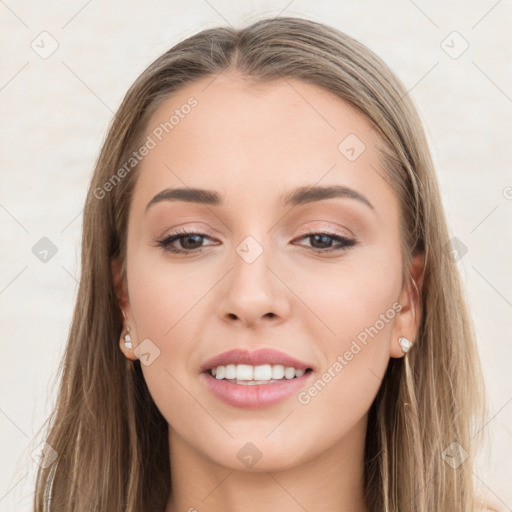 Joyful white young-adult female with long  brown hair and blue eyes