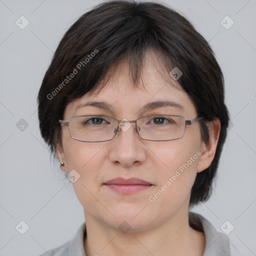 Joyful white adult female with medium  brown hair and brown eyes