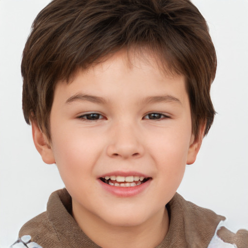 Joyful white child male with short  brown hair and brown eyes