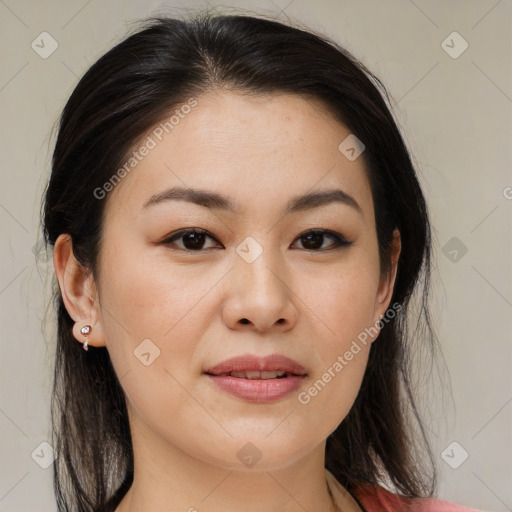 Joyful asian young-adult female with medium  brown hair and brown eyes