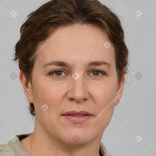 Joyful white adult female with short  brown hair and grey eyes