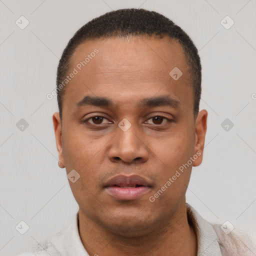 Neutral latino young-adult male with short  black hair and brown eyes