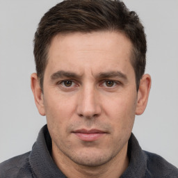 Neutral white adult male with short  brown hair and brown eyes