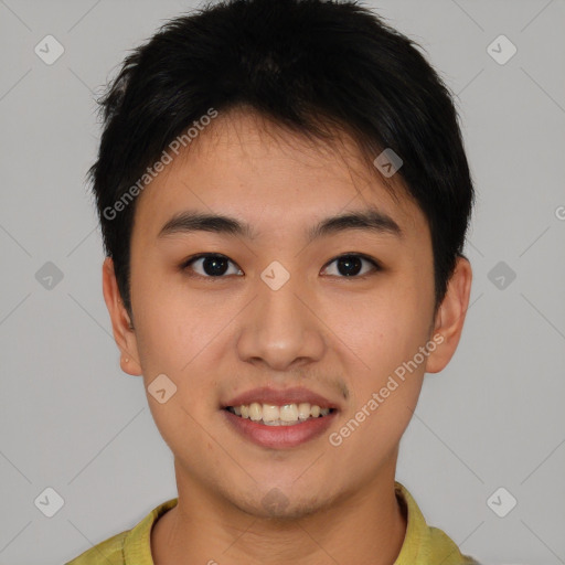 Joyful asian young-adult male with short  brown hair and brown eyes