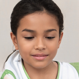 Joyful white child female with short  brown hair and brown eyes