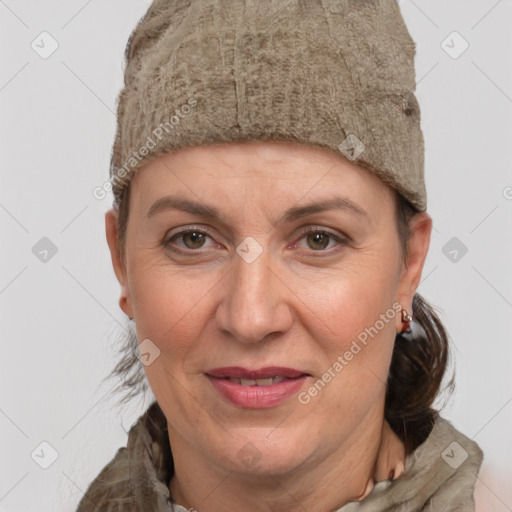 Joyful white adult female with short  brown hair and grey eyes