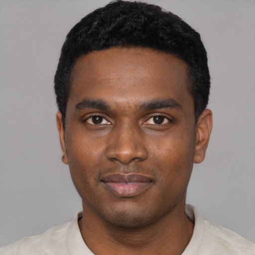 Neutral black young-adult male with short  black hair and brown eyes
