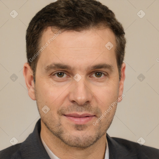 Joyful white adult male with short  brown hair and brown eyes