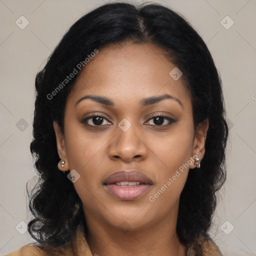Joyful black young-adult female with long  black hair and brown eyes