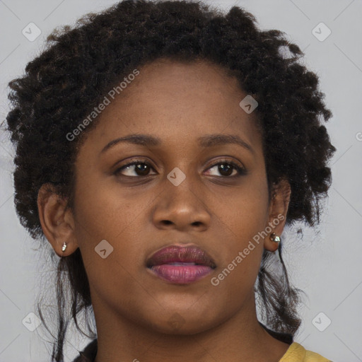 Neutral black young-adult female with short  brown hair and brown eyes