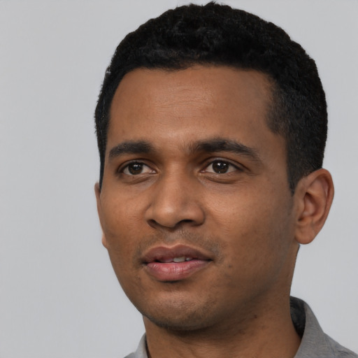 Neutral black young-adult male with short  black hair and brown eyes