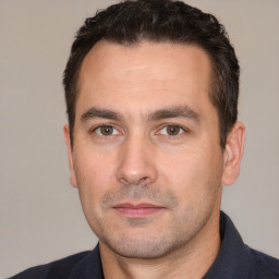 Neutral white adult male with short  brown hair and brown eyes