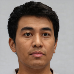 Neutral asian young-adult male with short  black hair and brown eyes