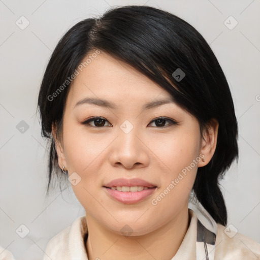Joyful asian young-adult female with medium  brown hair and brown eyes