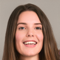 Joyful white young-adult female with long  brown hair and green eyes