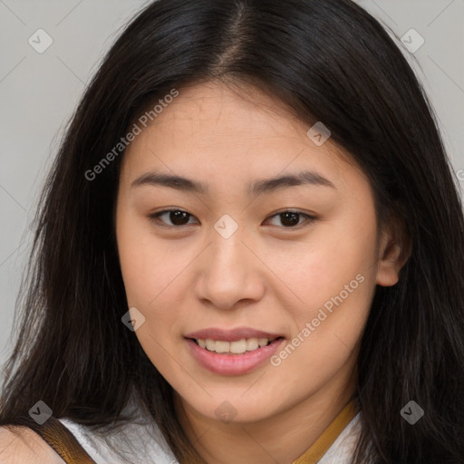 Joyful asian young-adult female with long  brown hair and brown eyes