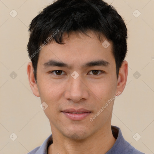 Joyful white young-adult male with short  black hair and brown eyes