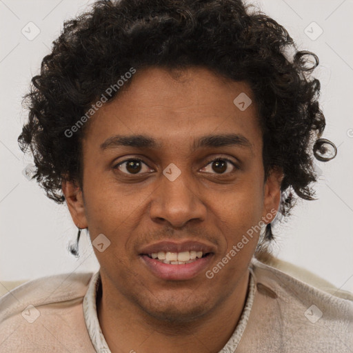 Joyful black young-adult male with short  brown hair and brown eyes