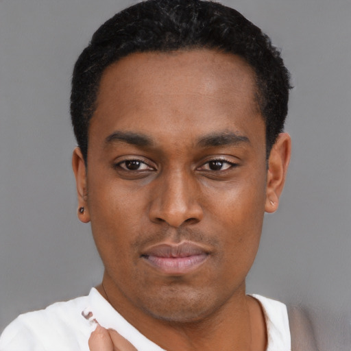 Neutral black young-adult male with short  black hair and brown eyes