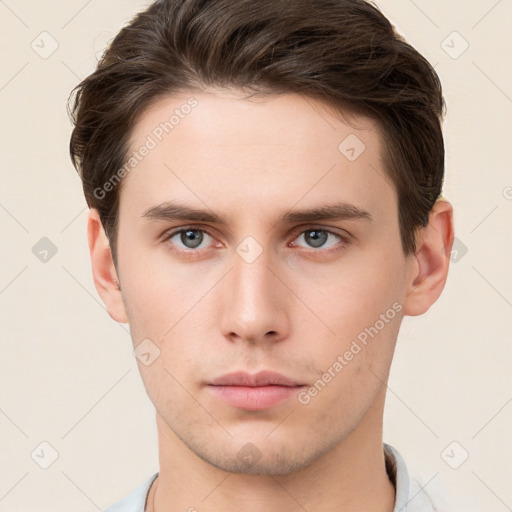 Neutral white young-adult male with short  brown hair and brown eyes