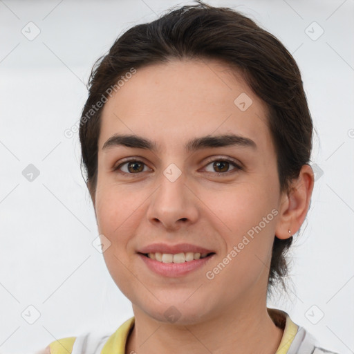 Joyful white young-adult female with short  brown hair and brown eyes