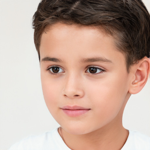 Joyful white child male with short  brown hair and brown eyes