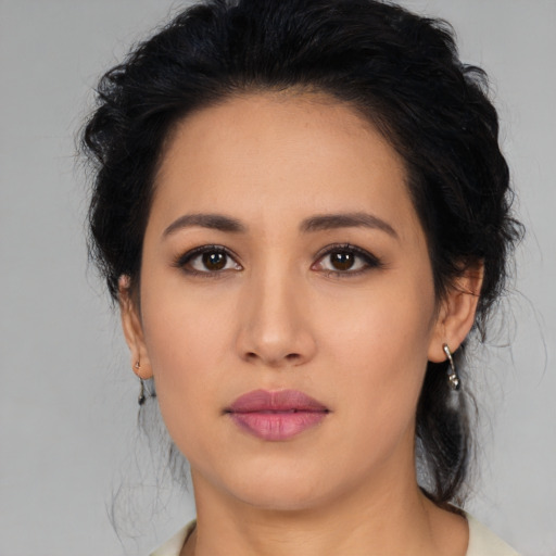 Neutral latino young-adult female with medium  black hair and brown eyes