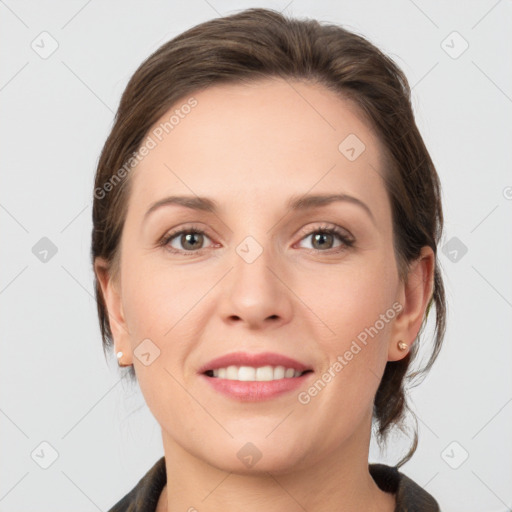 Joyful white young-adult female with medium  brown hair and grey eyes