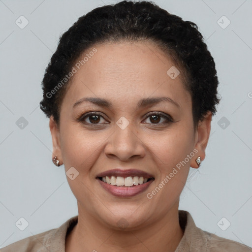 Joyful latino young-adult female with short  brown hair and brown eyes