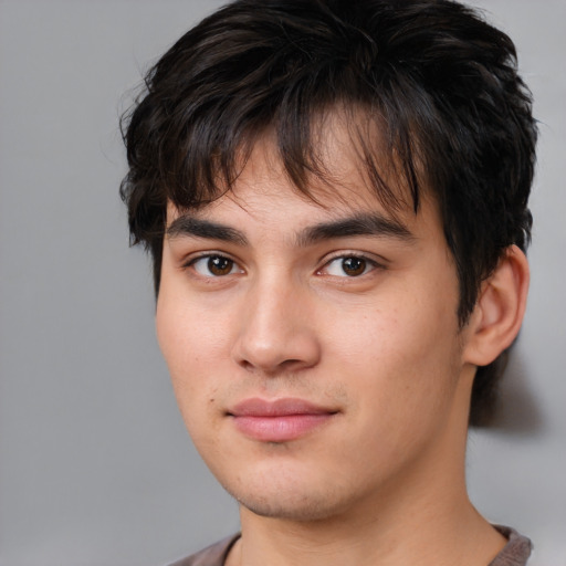 Joyful white young-adult male with medium  brown hair and brown eyes