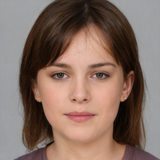 Neutral white young-adult female with medium  brown hair and brown eyes