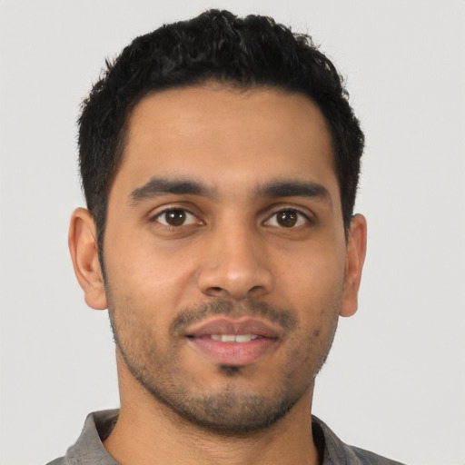 Neutral latino young-adult male with short  black hair and brown eyes