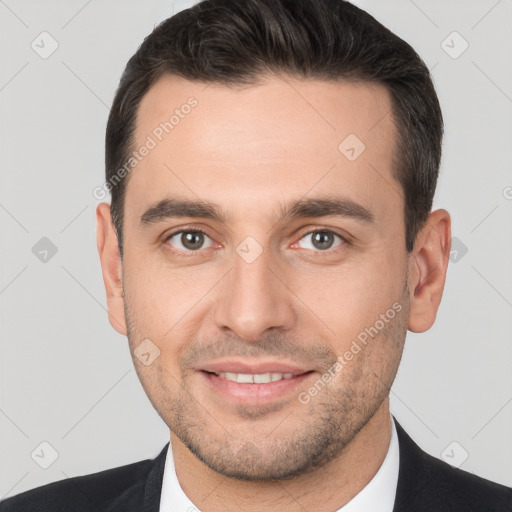 Joyful white young-adult male with short  brown hair and brown eyes