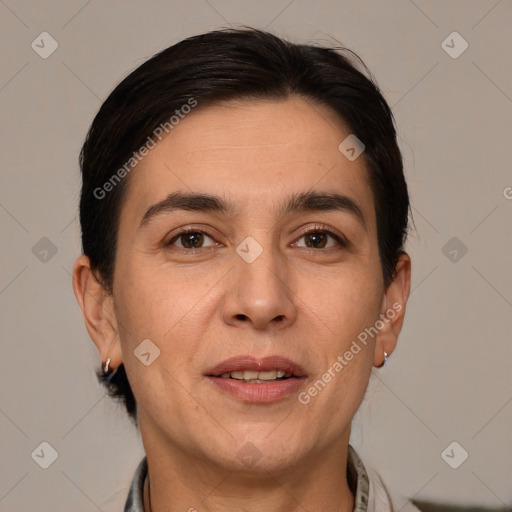 Joyful white adult female with short  brown hair and brown eyes