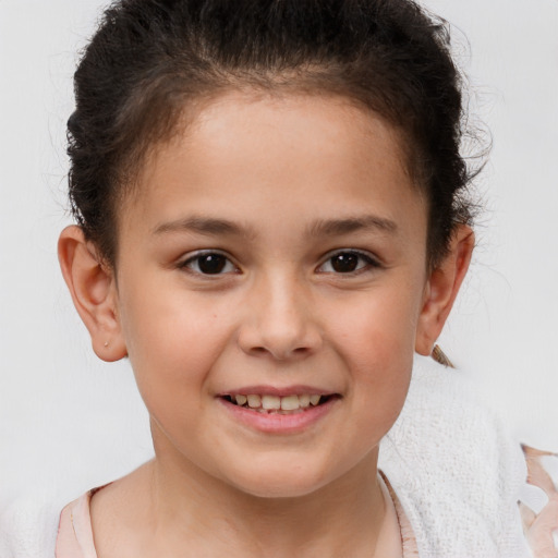 Joyful white child female with short  brown hair and brown eyes