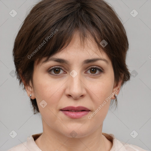 Joyful white adult female with medium  brown hair and brown eyes