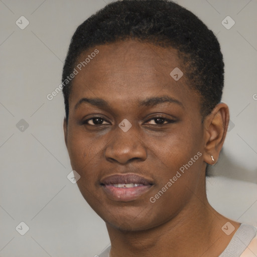 Joyful black young-adult female with short  brown hair and brown eyes