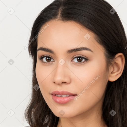 Neutral white young-adult female with long  brown hair and brown eyes