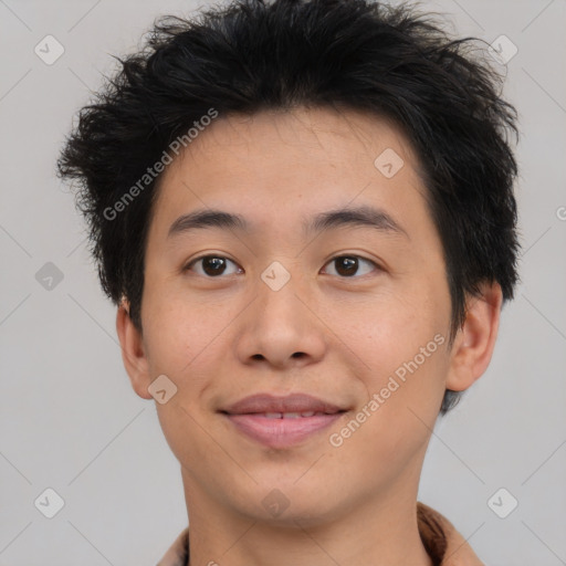 Joyful asian young-adult male with short  brown hair and brown eyes