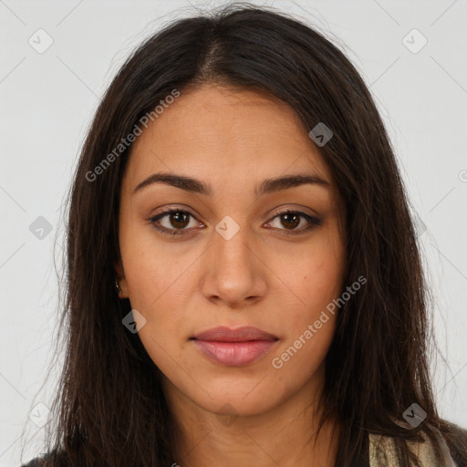 Joyful latino young-adult female with long  brown hair and brown eyes