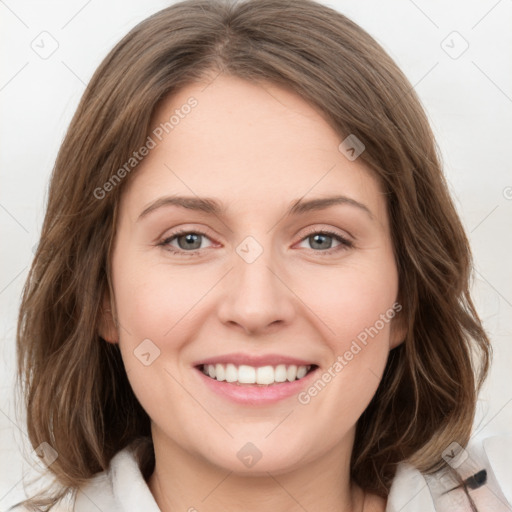 Joyful white young-adult female with medium  brown hair and green eyes