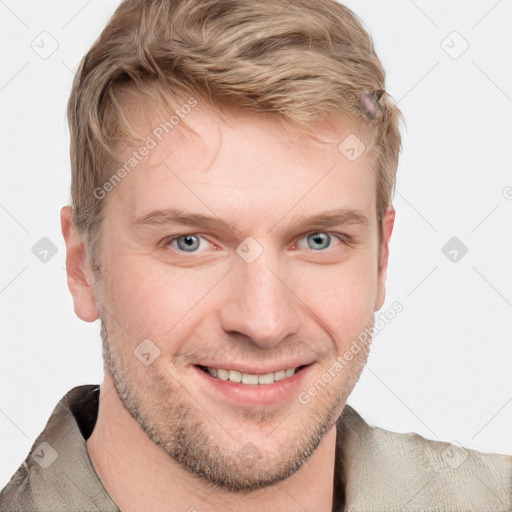 Joyful white young-adult male with short  brown hair and blue eyes