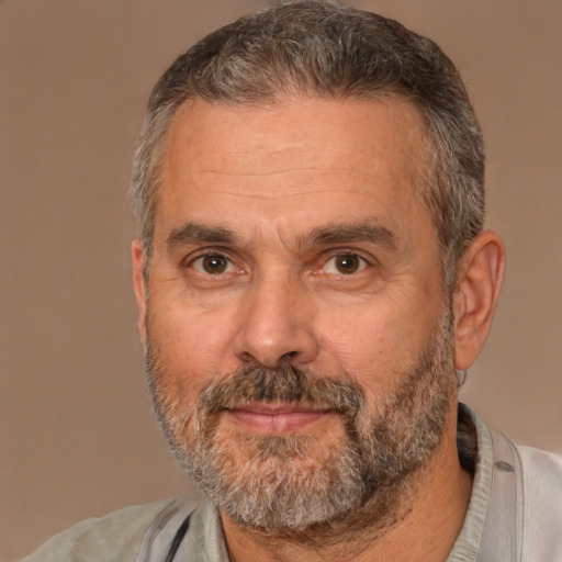 Neutral white middle-aged male with short  gray hair and brown eyes