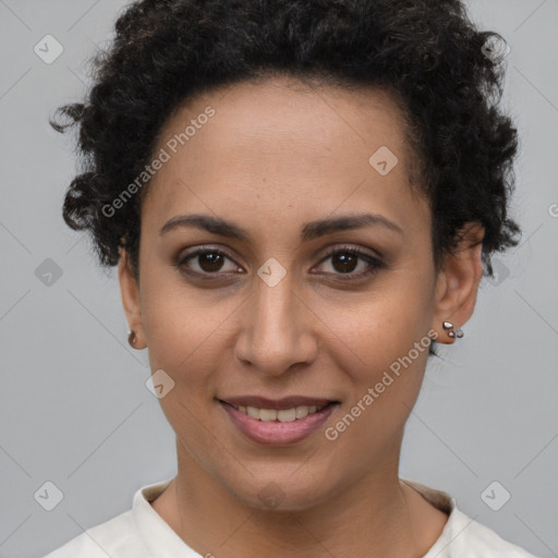 Joyful latino young-adult female with short  brown hair and brown eyes