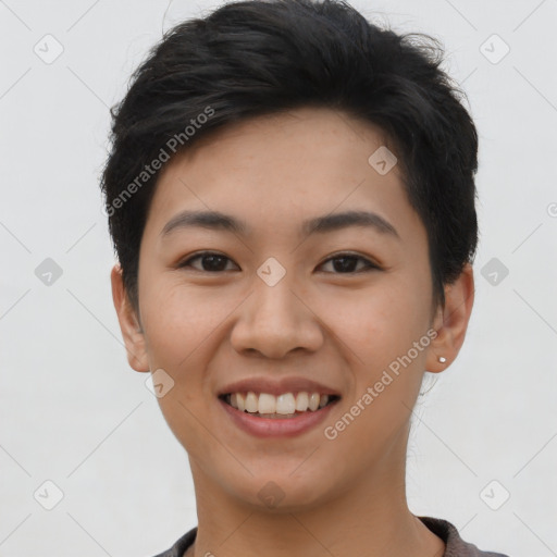 Joyful asian young-adult female with short  brown hair and brown eyes