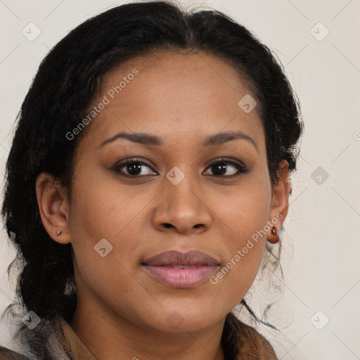 Joyful black young-adult female with long  brown hair and brown eyes